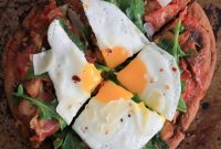 Grilled Pita Pizza with Prosciutto, Chanterelles, Arugula and Fried Egg