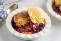 Summer Blueberry Peach Cobbler with Buttery Biscuit Topping
