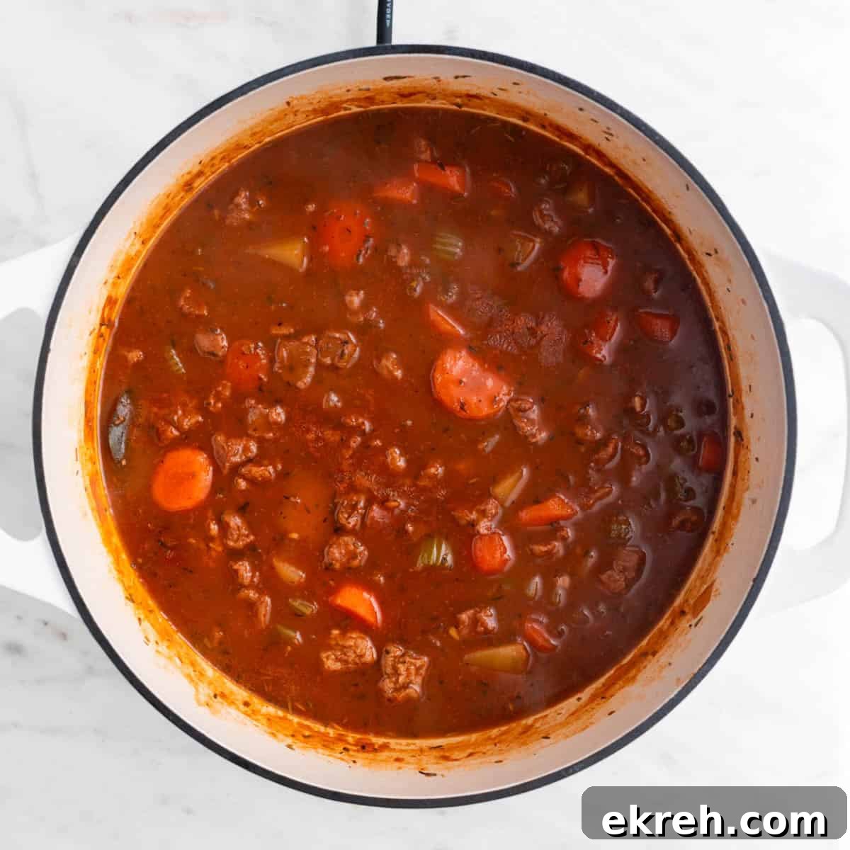 Hearty Vegan Beef-Style Stew with Plant-Based Chunks 8 Vegan beef stew cooked before adding the peas.