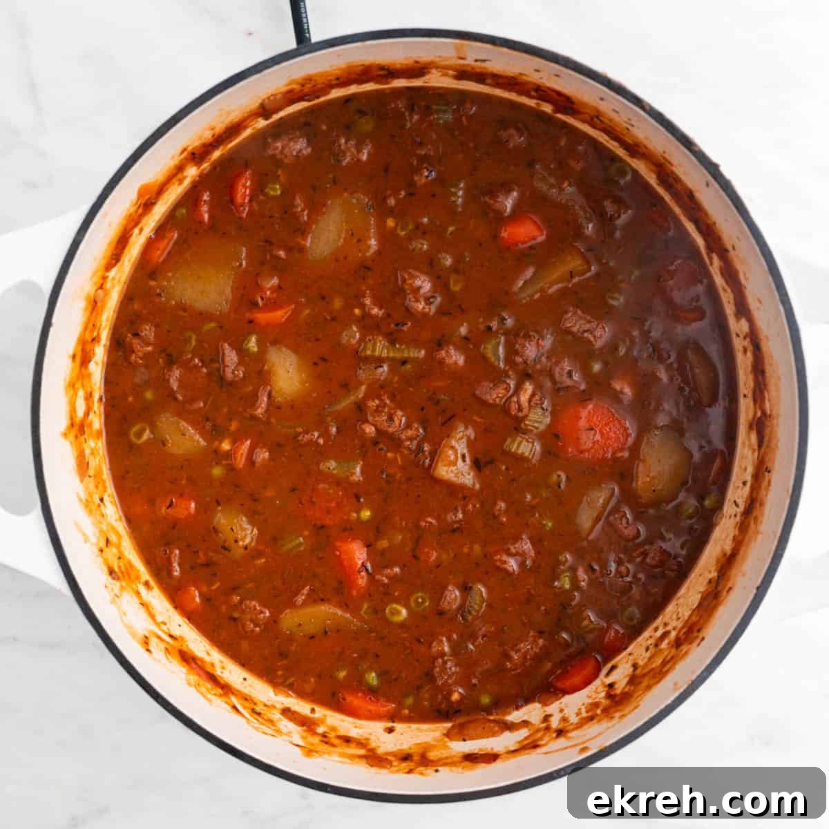 Hearty Vegan Beef-Style Stew with Plant-Based Chunks 9 Vegan beef stew cooked in a large pot.