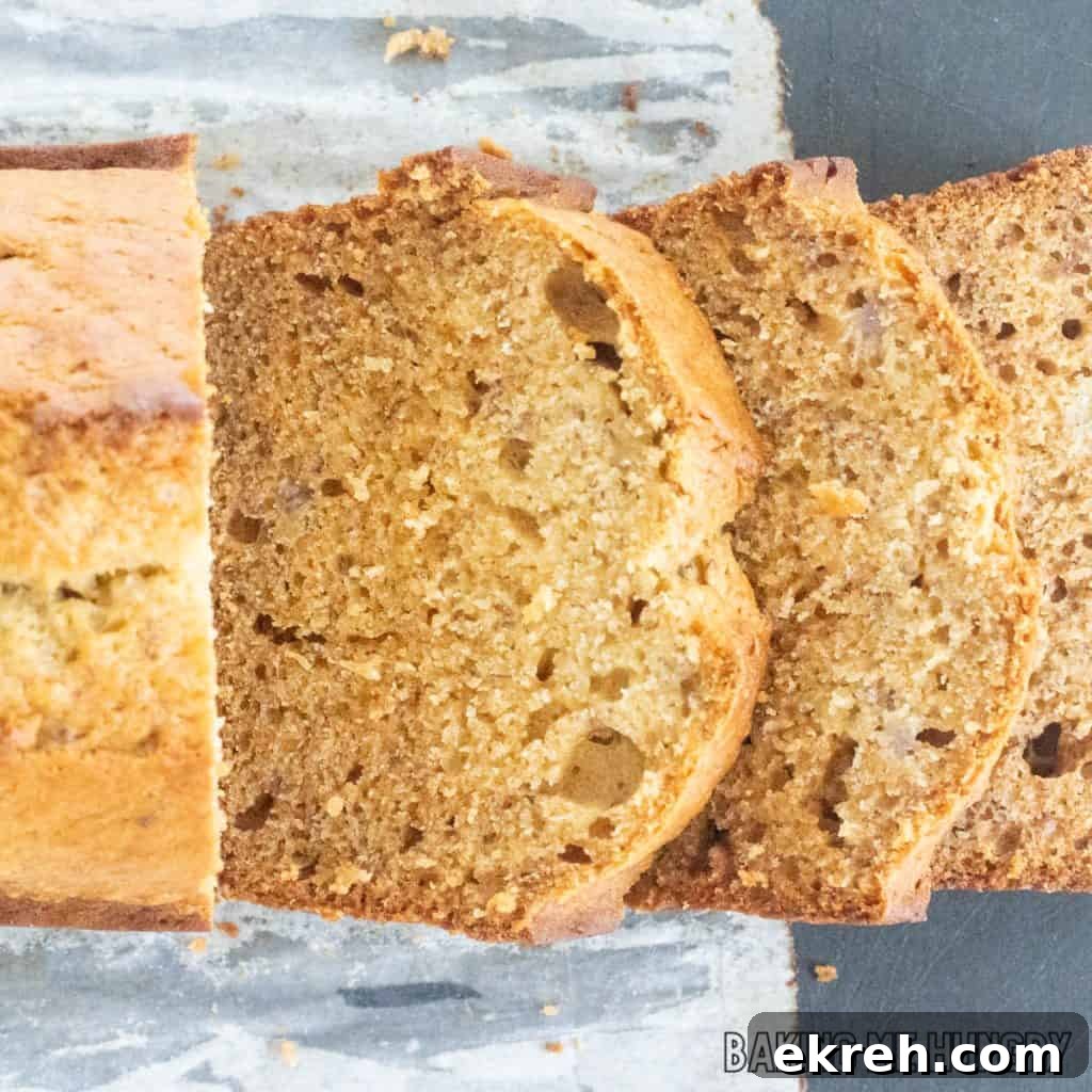 honey banana bread recipe sliced on cutting board