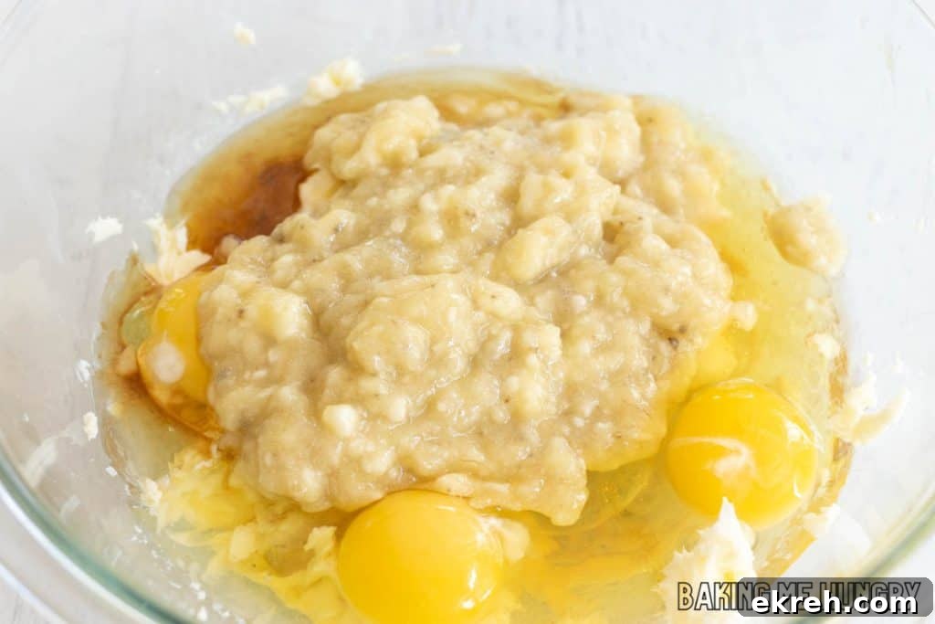 mashed banana added to bowl