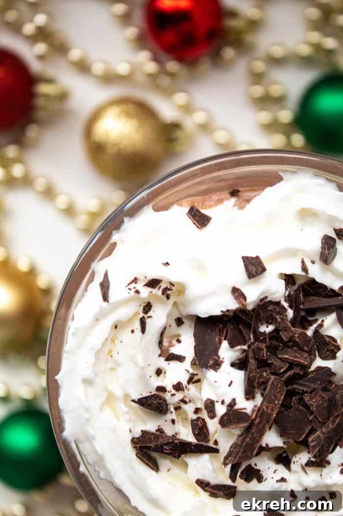 3-Ingredient Keto Whipped Cream Recipe 11 closeup overhead view of keto peppermint mocha with christmas decor on ground