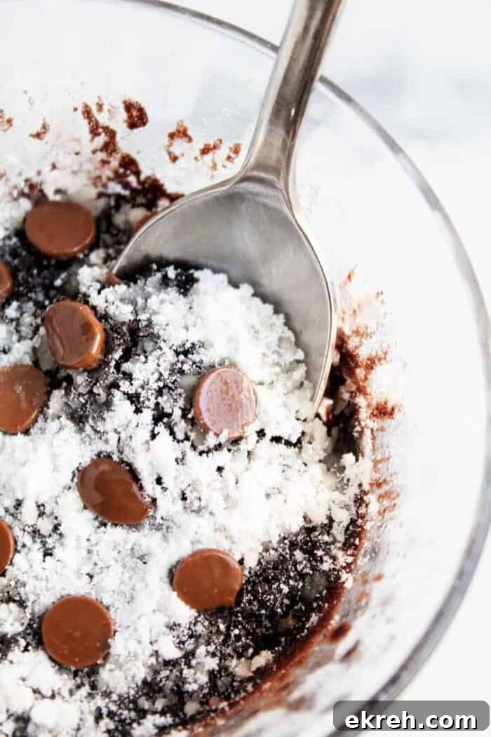 3-Ingredient Keto Whipped Cream Recipe 19 closeup of keto mug brownie with a spoon inside dish
