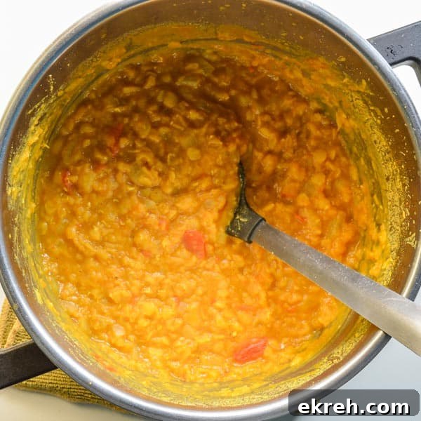 25-Minute Restaurant-Style Dal Tadka Recipe 6 Cooked yellow lentils in a pot