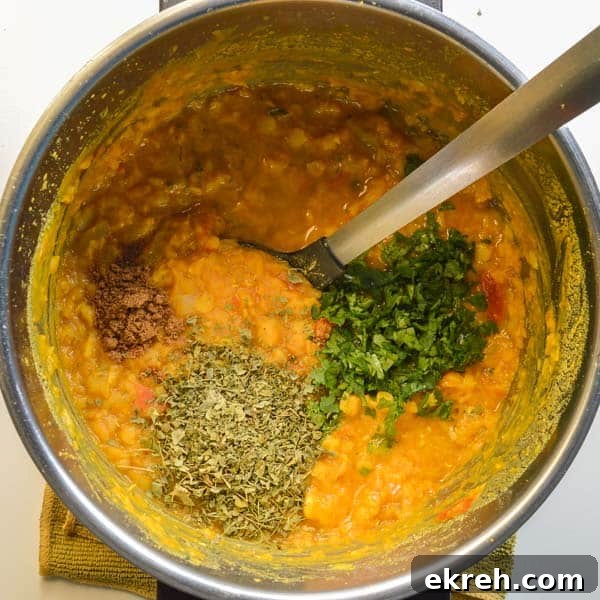 25-Minute Restaurant-Style Dal Tadka Recipe 7 Cooked yellow lentils with coriander and spices