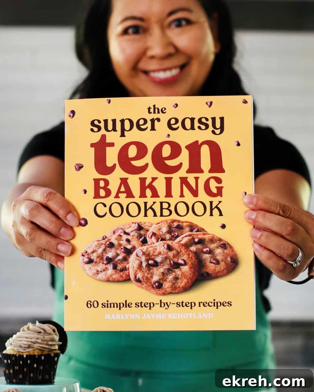 Chocolate Chip Cupcakes with Cookie Dough Frosting Recipe 21 Marlynn holding out Super Easy Teen Cookbook