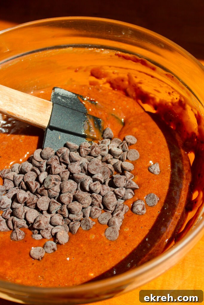 Decadent Fudgy Pumpkin Brownies Recipe 6 Pouring batter into pan