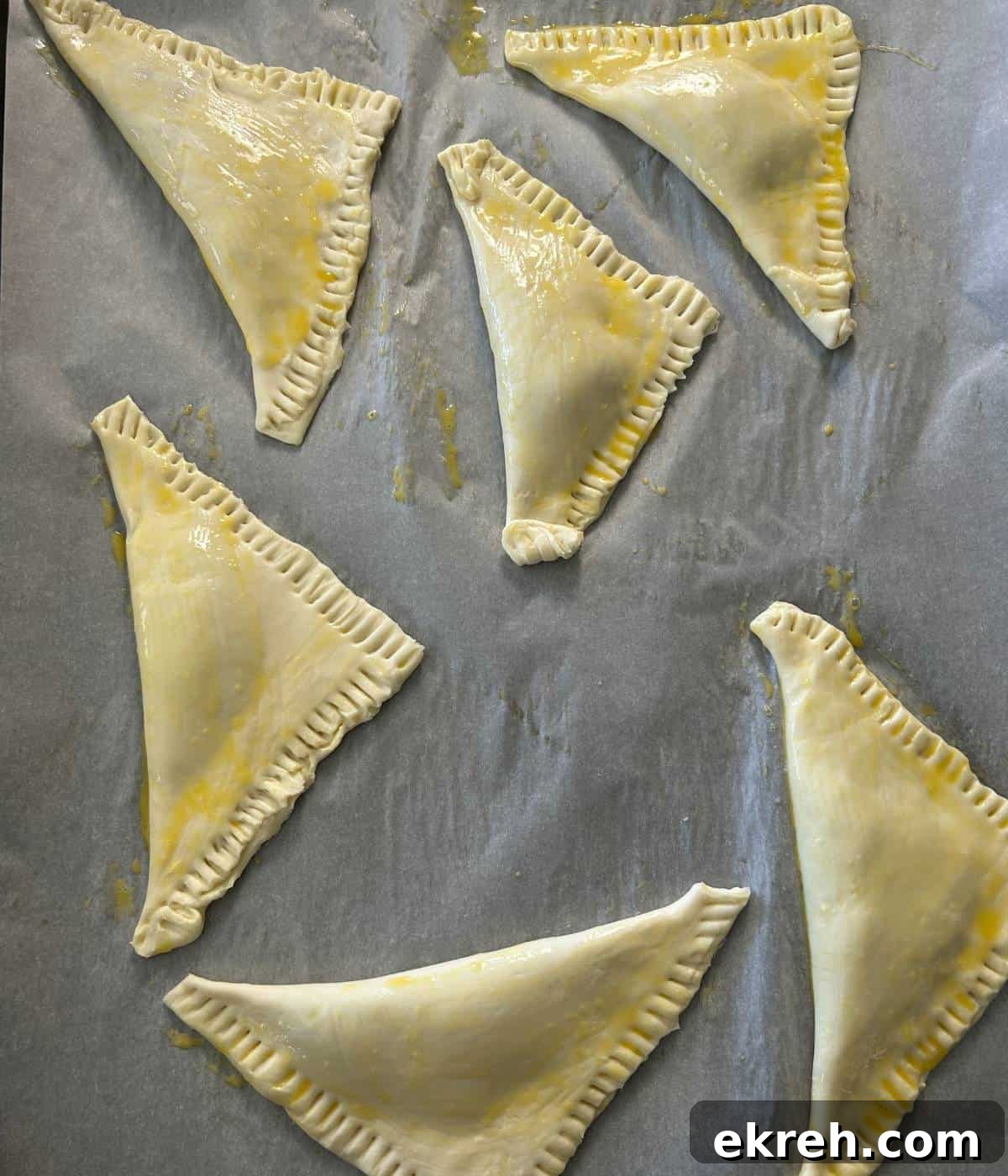 Strawberry turnovers on tray.