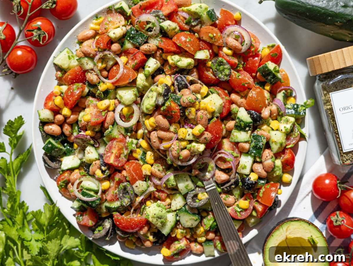 Step 4 Tossing pinto bean salad and serving it on a platter.