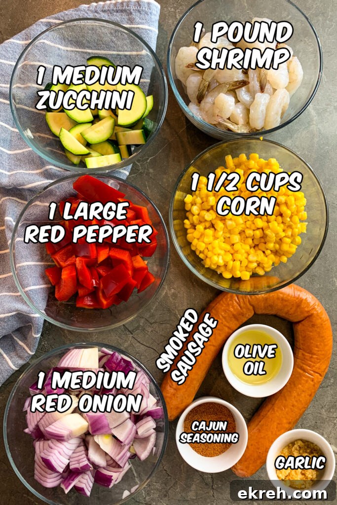 All the ingredients to make cajun foil packets.