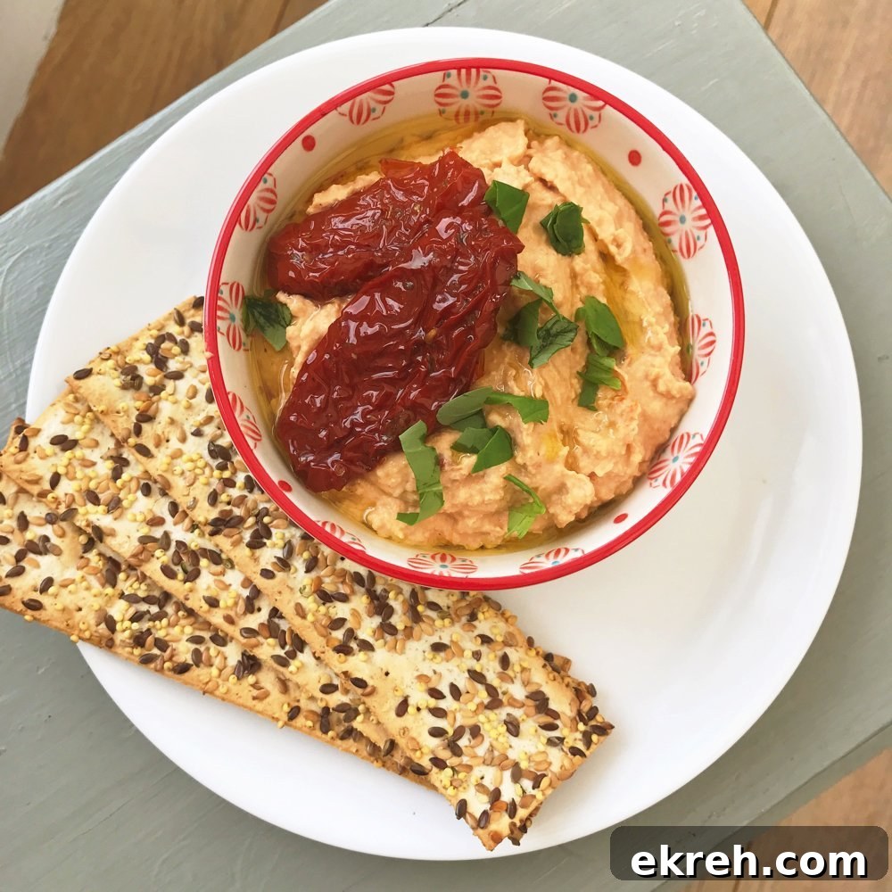 Quick Party Food Ideas That Taste Incredible 10 hummus with sun dried tomatoes, quick hummus recipe, healthy snack recipes