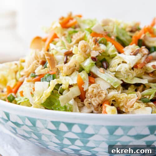 Fennel, Orange and Arugula Salad 9 asian cabbage salad in a blue and white decorative bowl.