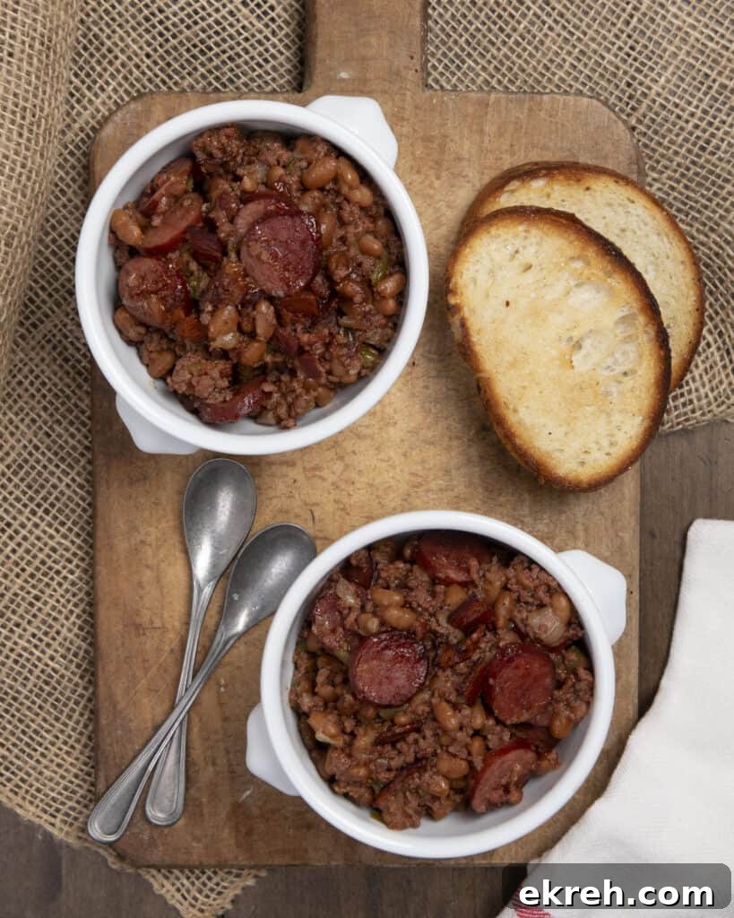 Smoky Loaded Baked Beans with Bacon and Brown Sugar 7 Loaded baked beans served in a bowl