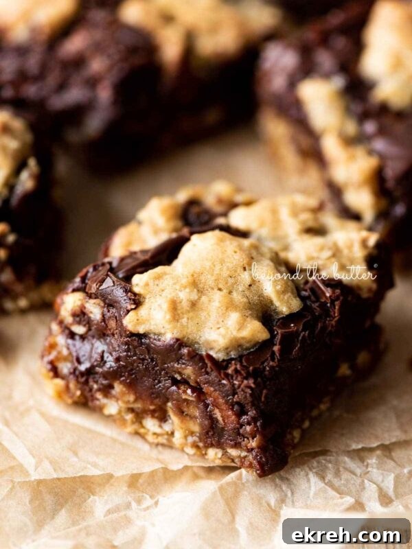 Pumpkin Pie Cake Bars Recipe 11 Oatmeal fudge nut bars randomly placed on crinkled brown parchment paper.