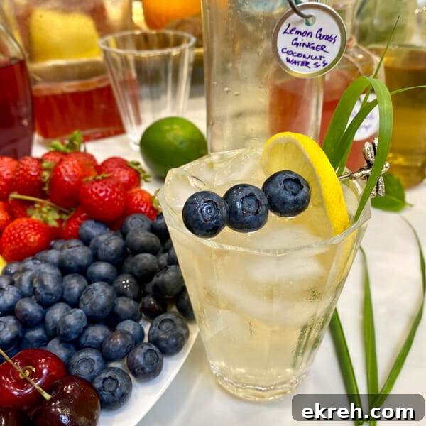 Herb-Infused Simple Syrup Recipe for Cocktails and Mocktails 7 blue ginger spritzer mocktail in glass