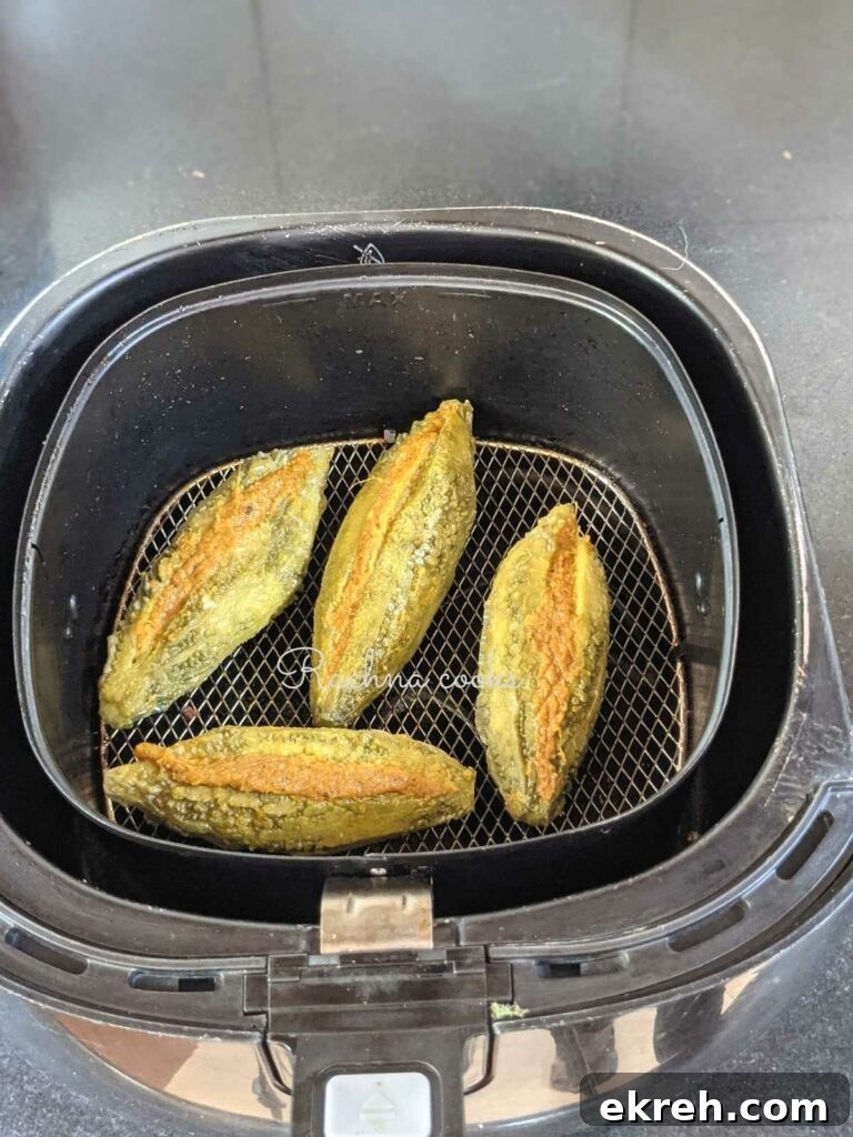 karelas in air fryer basket ready for air frying.