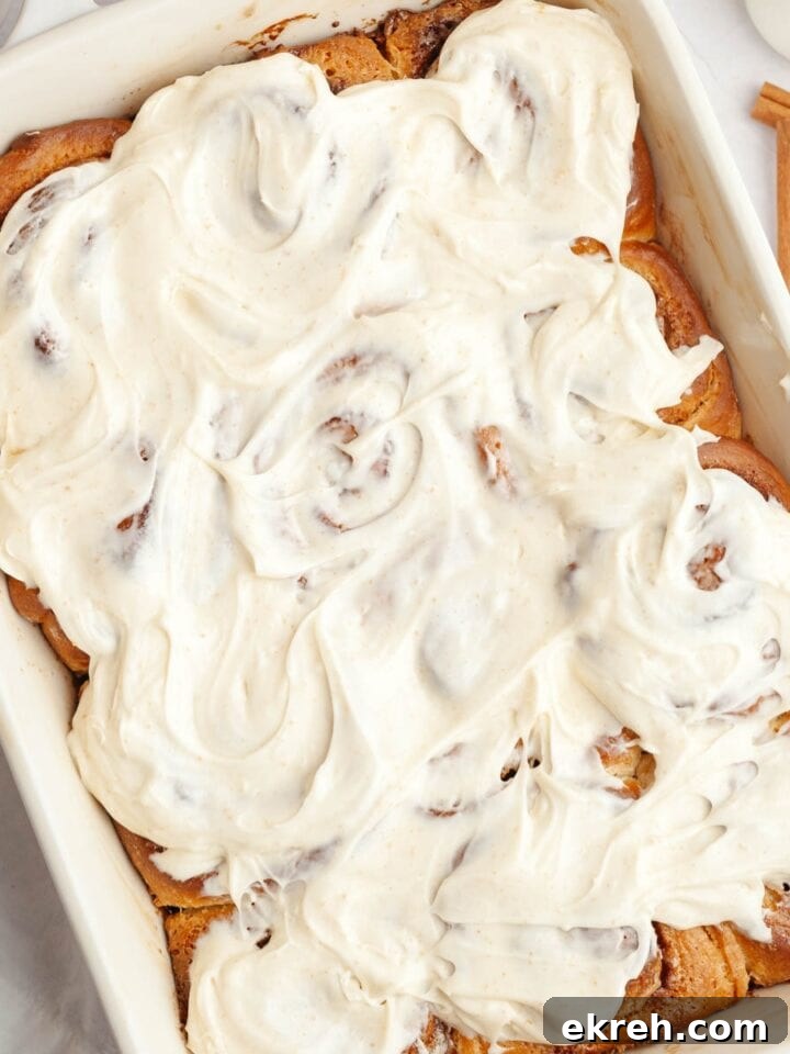 Brown butter cinnamon rolls covered with brown butter frosting.