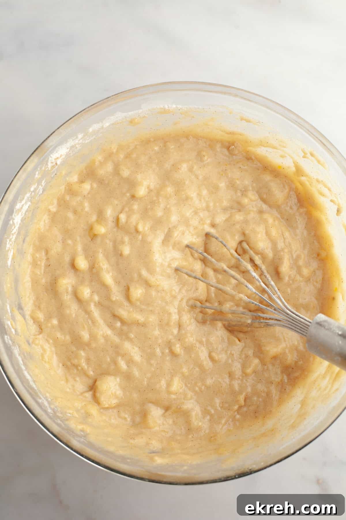 Banana muffin batter in a bowl.
