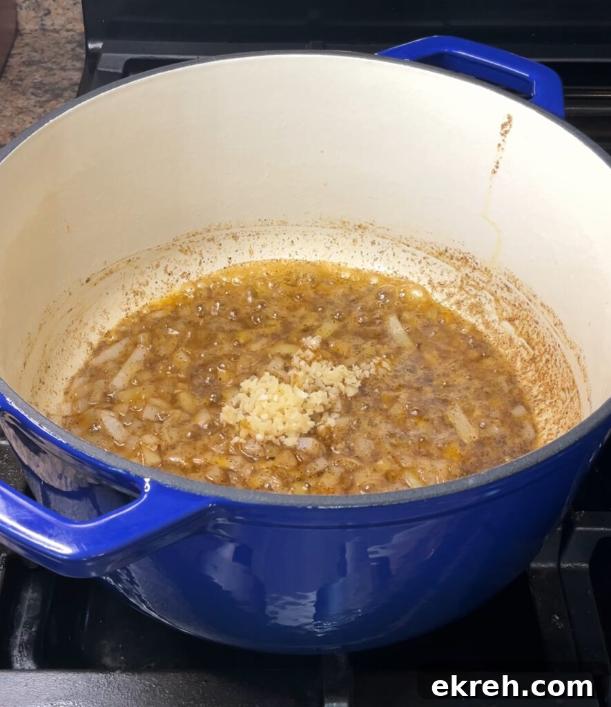 Homemade Creamy Broccoli Cheddar Soup Recipe 11 Add garlic and carrots