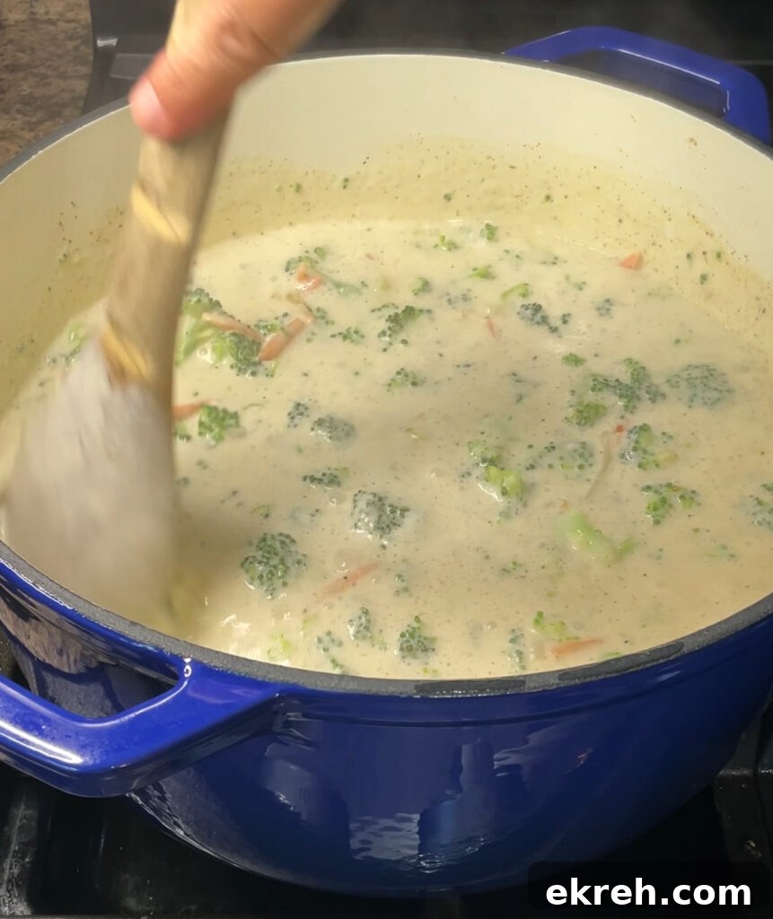 Homemade Creamy Broccoli Cheddar Soup Recipe 18 Simmering broccoli cheddar soup