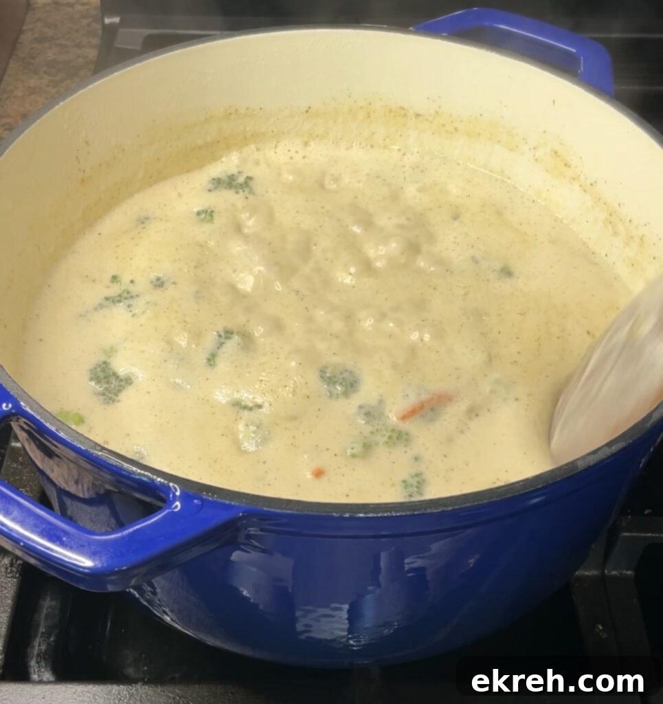 Homemade Creamy Broccoli Cheddar Soup Recipe 19 Broccoli cooking in soup