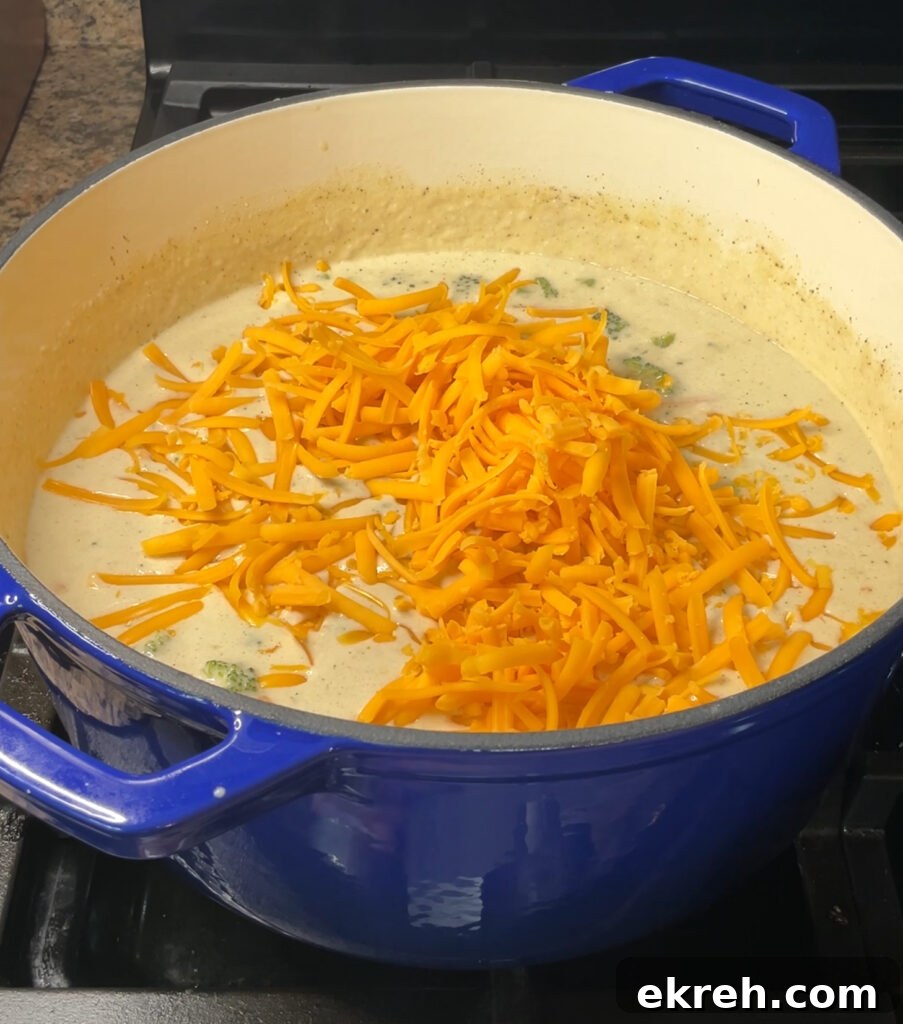 Homemade Creamy Broccoli Cheddar Soup Recipe 20 Melting cheddar into soup