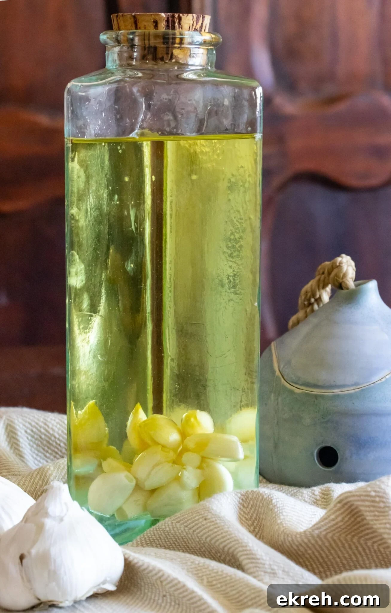 Garlic Olive Oil The finished garlic infused olive oil recipe is a glass bottle.