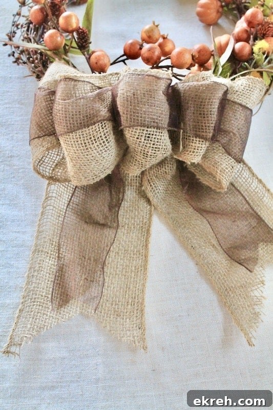 burlap bow fall wreath with pumpkins