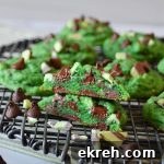 mint chocolate chip cookies arranged on a black wire rack