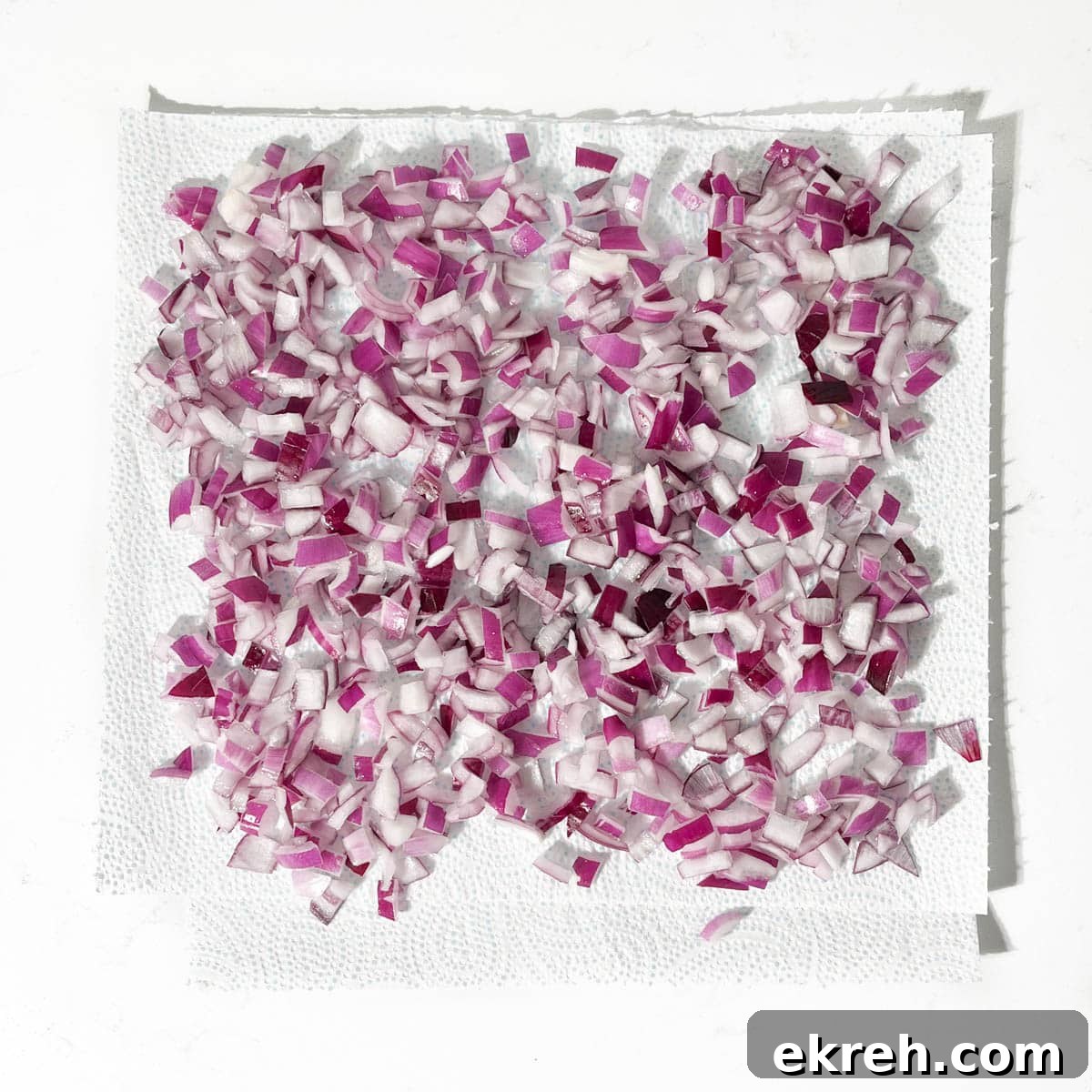 Tangy Indian Onion Chutney Recipe for Poppadoms 8 Chopped onions drying on kitchen paper.