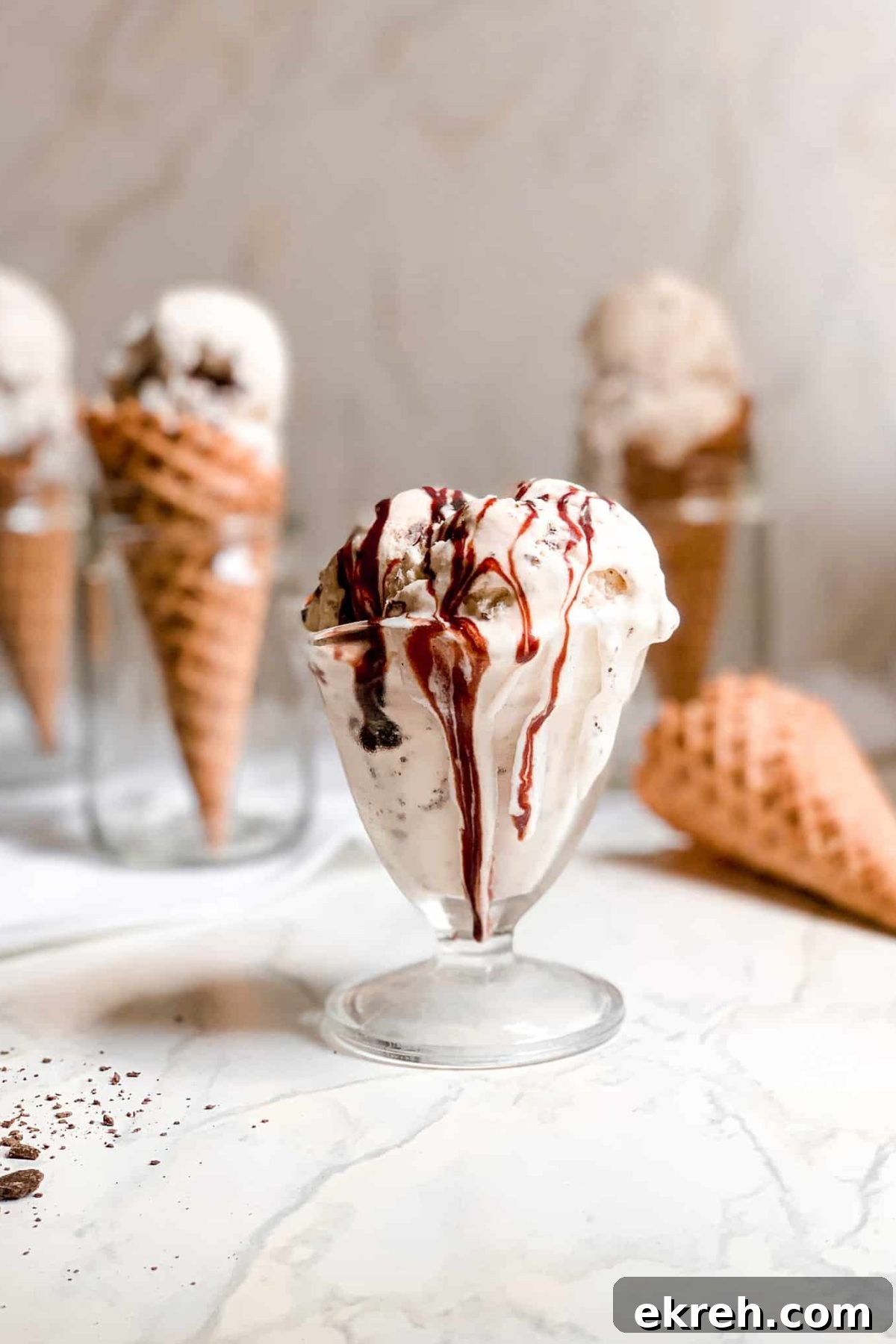 Vanilla Ice Cream in a Waffle Cone Propped Up in a Glass Cup for Food Photography Blog Baked Abundance