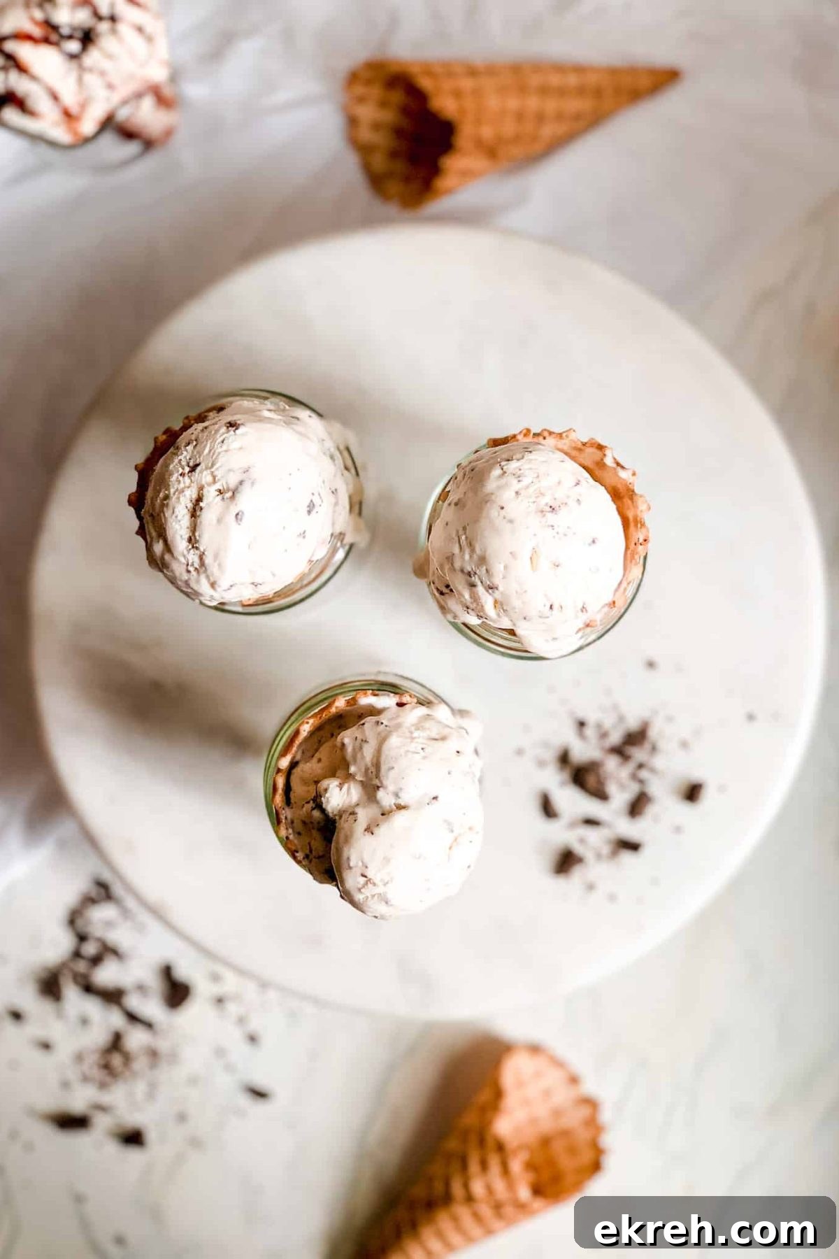 Vanilla Ice Cream in a Waffle Cone Propped Up in a Glass Cup for Food Photography Blog Baked Abundance