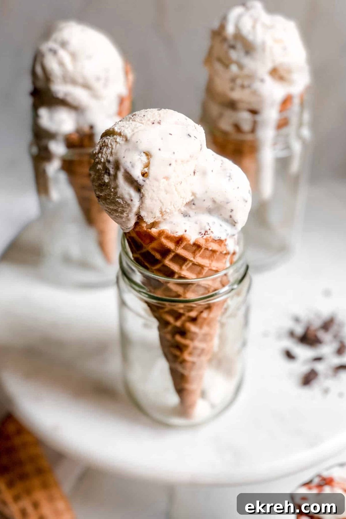 Vanilla Ice Cream in a Waffle Cone Propped Up in a Glass Cup for Food Photography Blog Baked Abundance