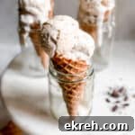 Vanilla Ice Cream in a Waffle Cone Propped Up in a Glass Cup for Food Photography Blog Baked Abundance