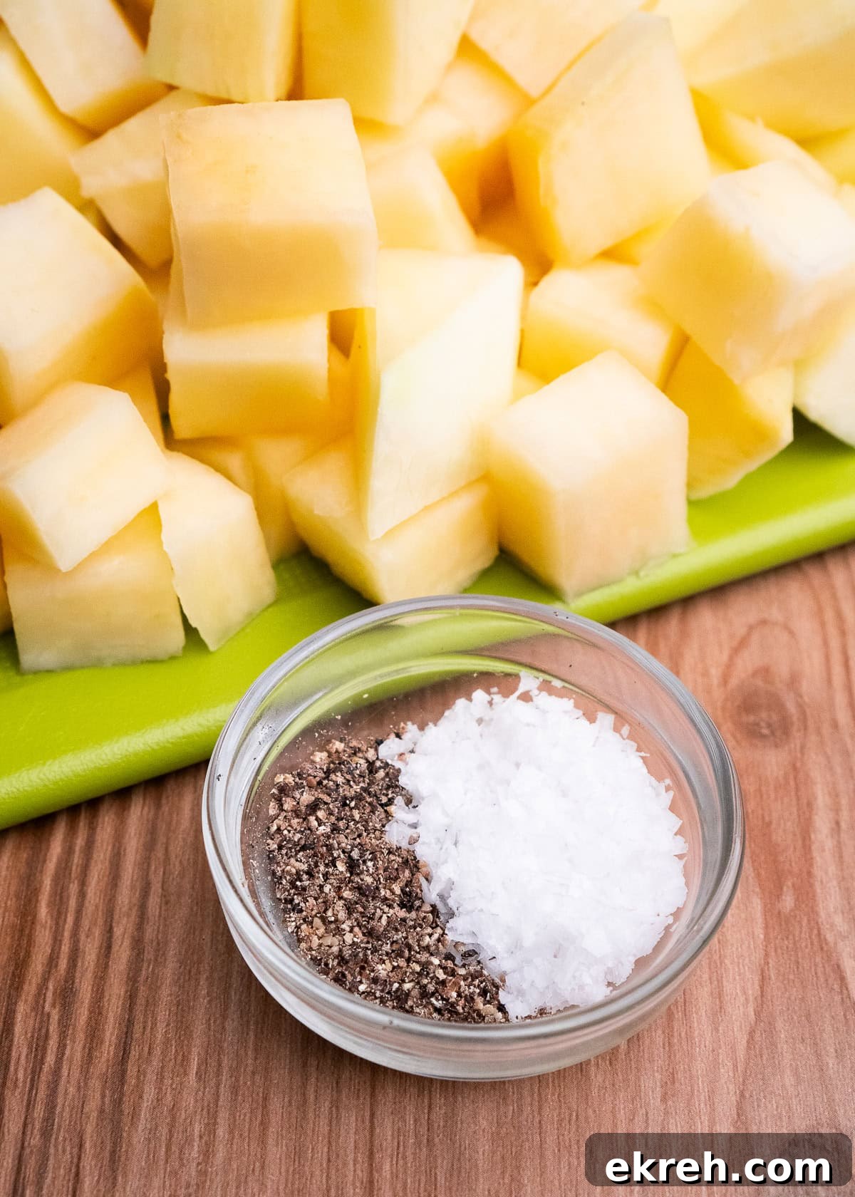 Salt and black pepper in a glass dish