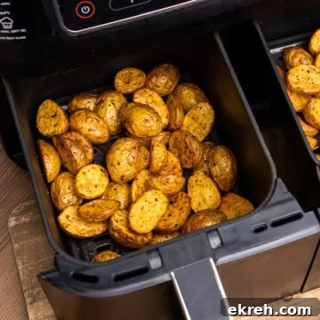 Air Fryer Baby Potatoes season with olive oil and piri piri