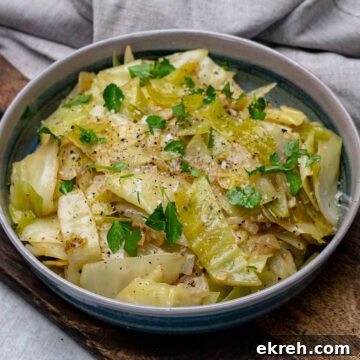 Braised Cabbage with salt and pepper and fresh chopped parsley on top