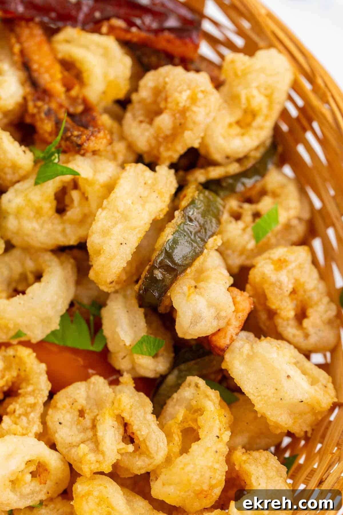 Fried crispy Italian calamari with peppers.