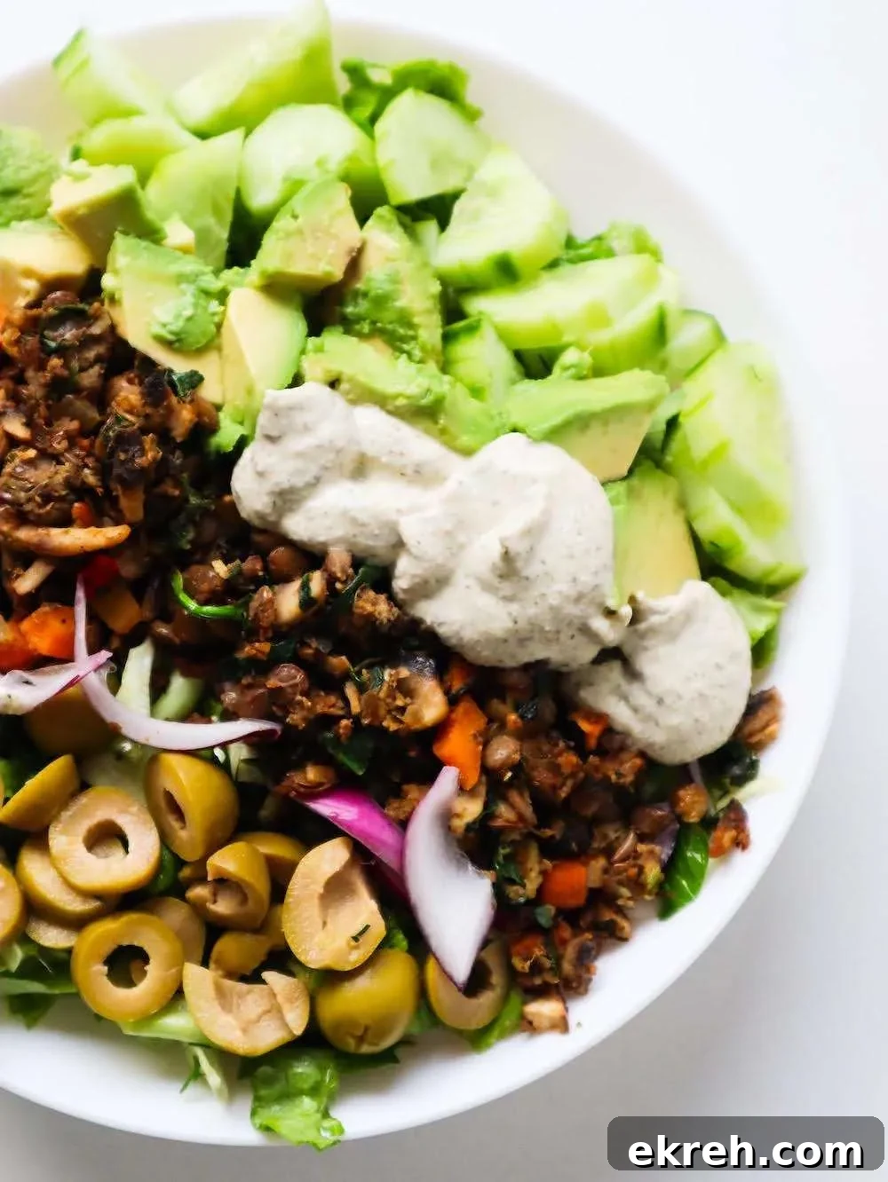 Spiced Lentil Bowls with salad, avocado and tzatziki