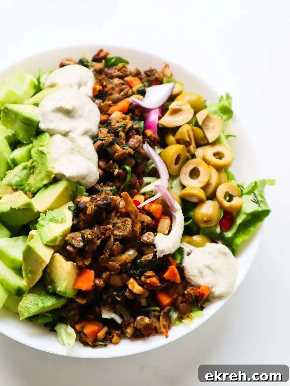 Spiced Lentil Bowls with salad, avocado and tzatziki