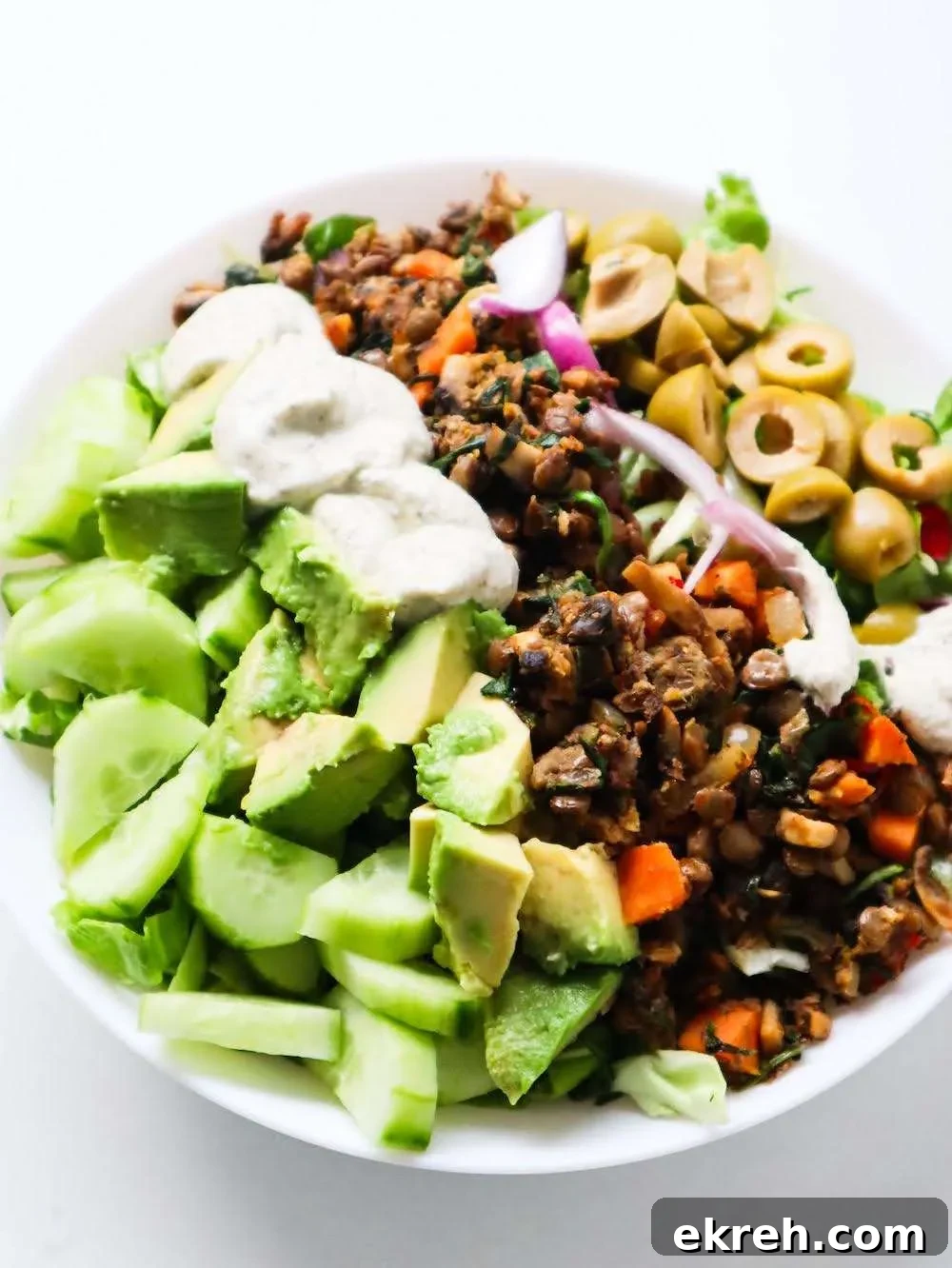 Spiced Lentil Bowls with salad, avocado and tzatziki