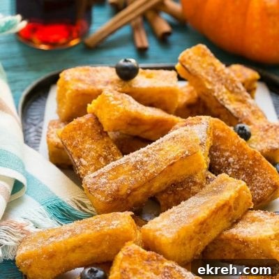 Light and fluffy pumpkin french toast sticks coated in cinnamon sugar. They're super fun to eat and they taste like a churro!