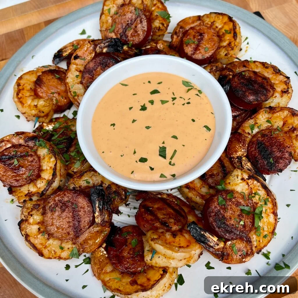 Shrimp wrapped around sausage medallions on skewers