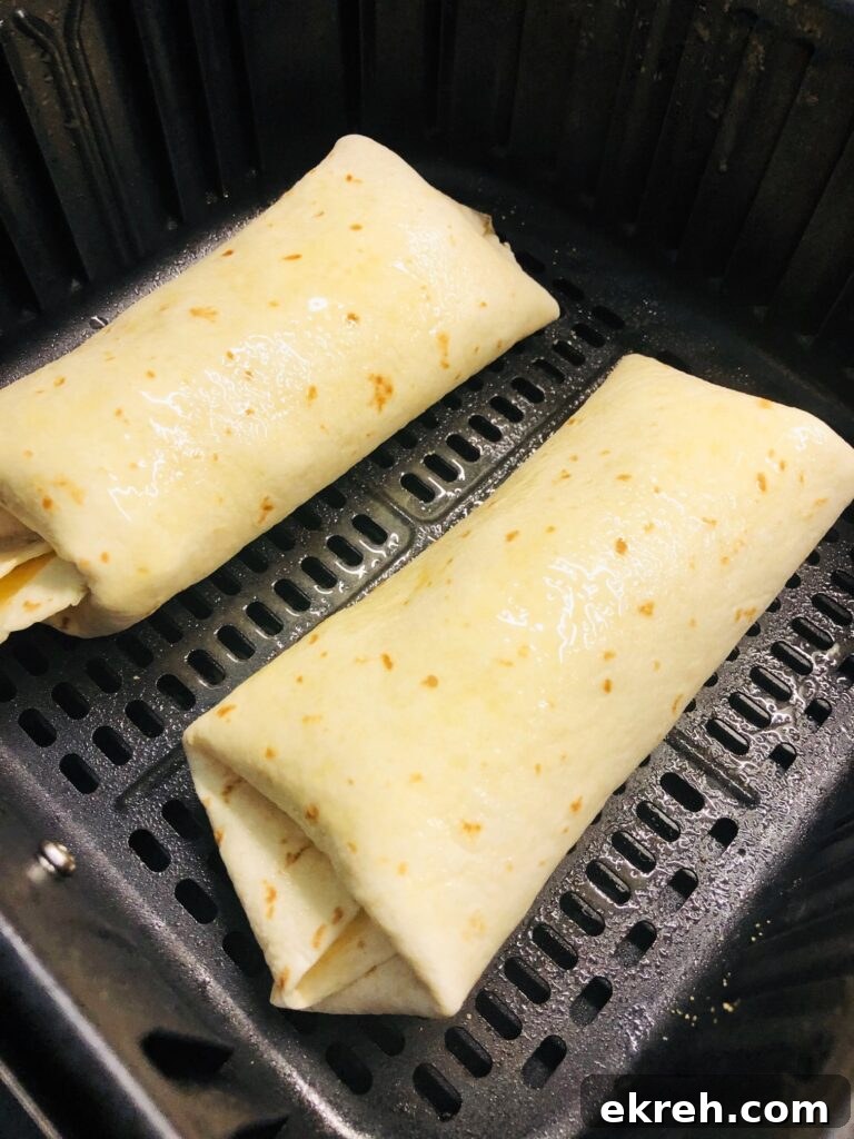 Air Fryer Philly Chicken Burritos Recipe 7 two burritos in the air fryer before cooking
