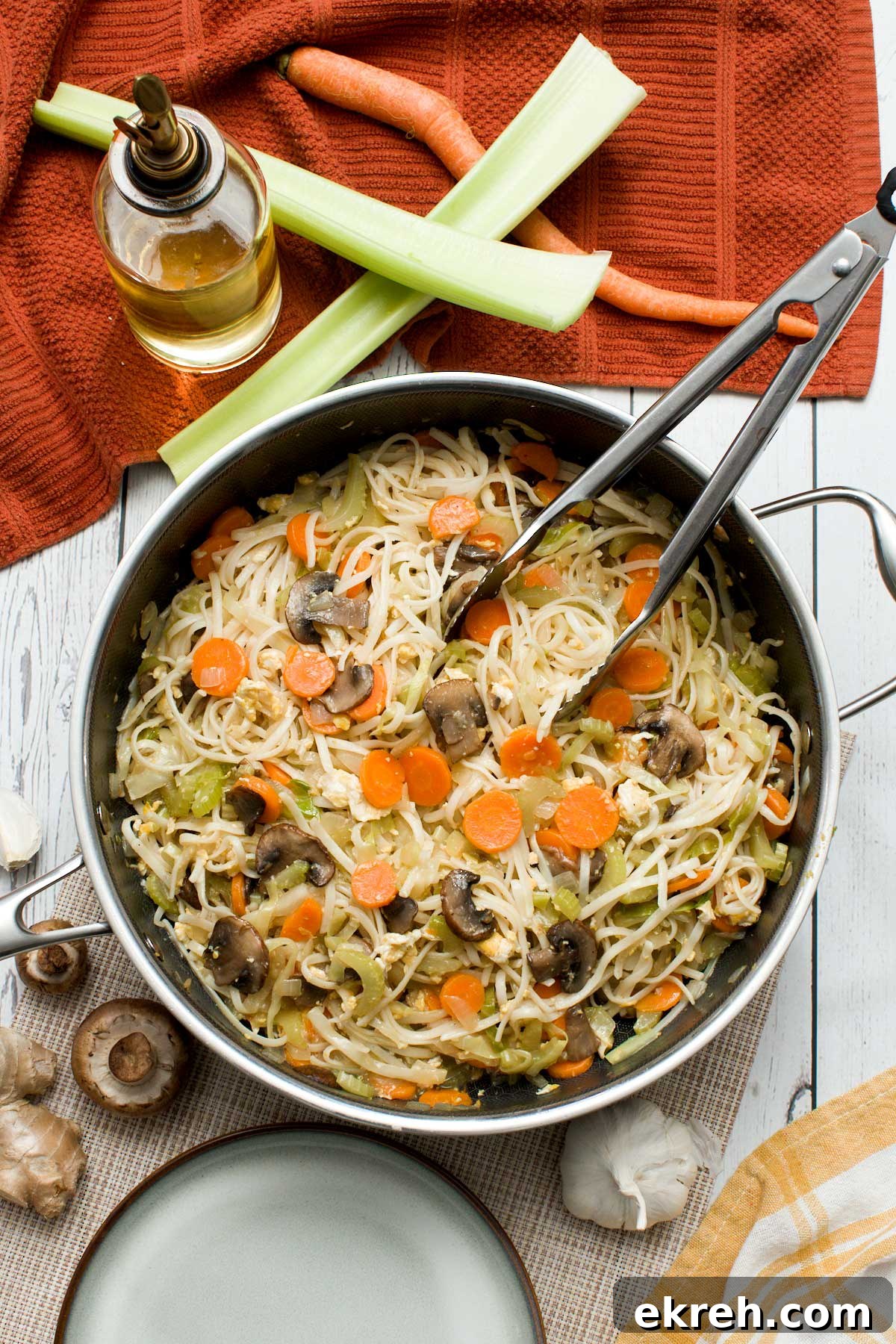 A hexClad hybrid deep sauté pan with gluten-free chow mein with vegetables.