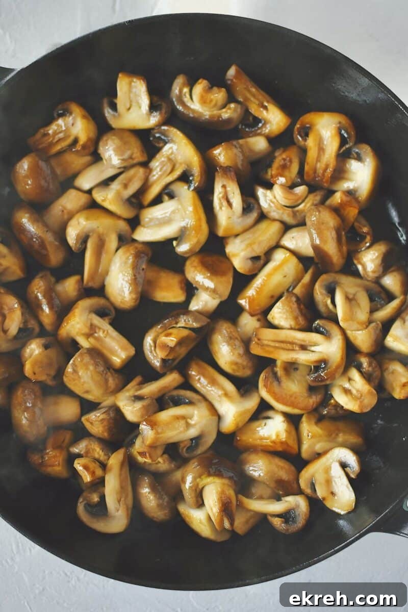 Garlic Butter Sauteed Mushrooms with Caramelized Onions 5 Mushrooms after steaming for 5 minutes.