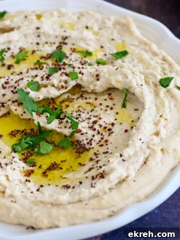 Tahini Sauce Recipe: Creamy Salad Dressing and Dips 14 Bowl of hummus.