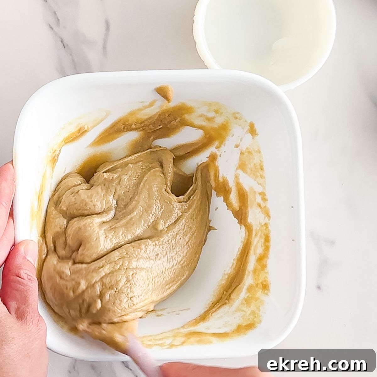 Tahini Sauce Recipe: Creamy Salad Dressing and Dips 5 Mixing the ingredients.