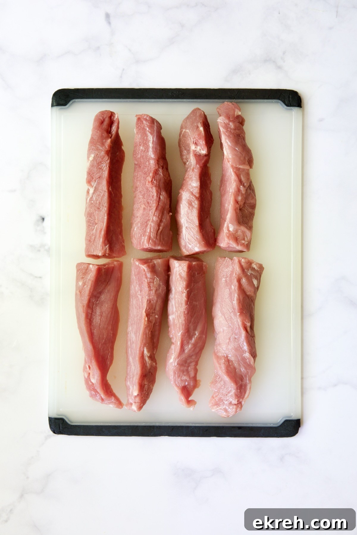 Grilled Citrus Mojo Pork Tenderloin Skewers 7 Pork tenderloins cut into eight long strips.